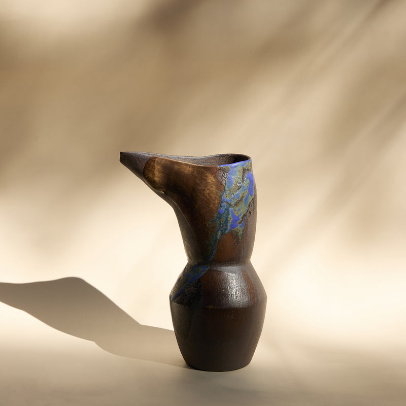 raw pitcher with cobalt mark